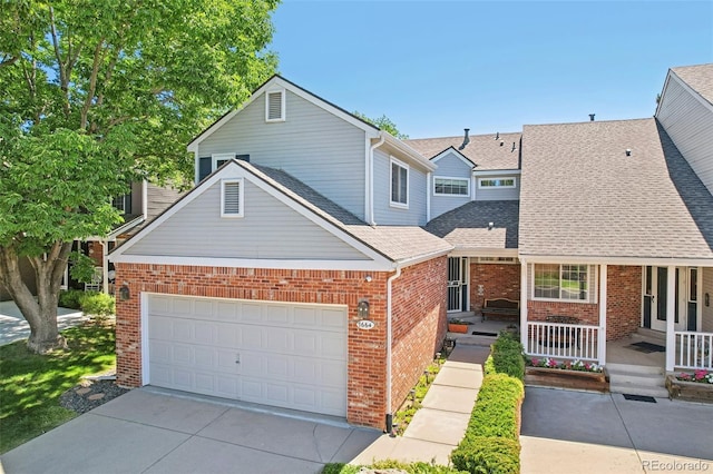 7664 S Ivanhoe Way, Centennial, CO 80112 - traditional-style house featuring brick siding, concrete driveway, a shingled roof, and a porch