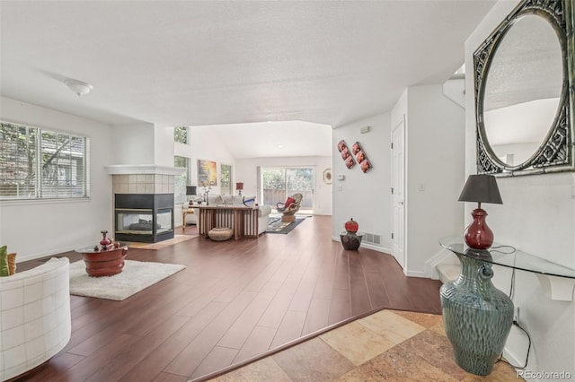 7664 S Ivanhoe Way, Centennial, CO 80112 - living area with wood finished floors and a fireplace