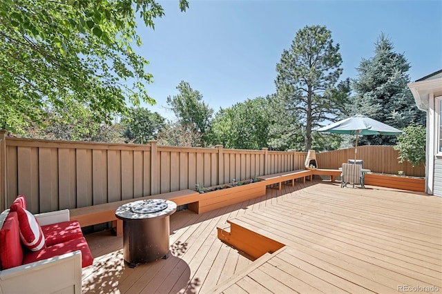 7664 S Ivanhoe Way, Centennial, CO 80112 - wooden deck featuring a fenced backyard