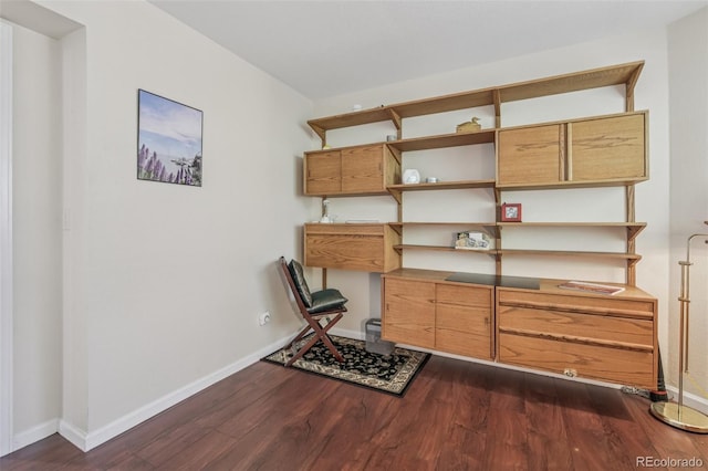 7664 S Ivanhoe Way, Centennial, CO 80112 - home office featuring dark wood finished floors and baseboards