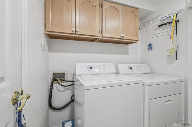 7664 S Ivanhoe Way, Centennial, CO 80112 - laundry room with cabinet space and separate washer and dryer
