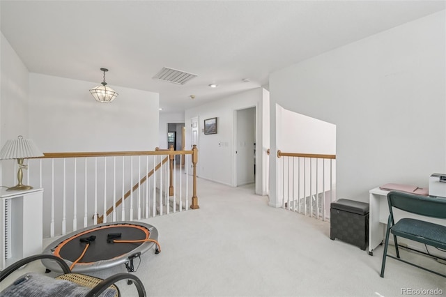 7664 S Ivanhoe Way, Centennial, CO 80112 - hallway with an upstairs landing and carpet