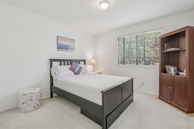 7664 S Ivanhoe Way, Centennial, CO 80112 - bedroom with light carpet and baseboards