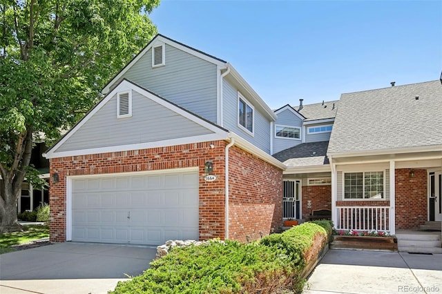 7664 S Ivanhoe Way, Centennial, CO 80112 - traditional-style home featuring brick siding, concrete driveway, and roof with shingles