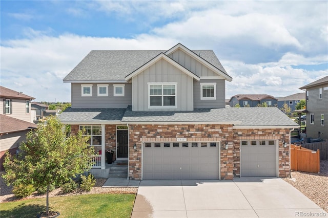 1315 Sidewinder Cir, Castle Rock, CO 80108 - craftsman inspired home with board and batten siding, concrete driveway, roof with shingles, and a garage