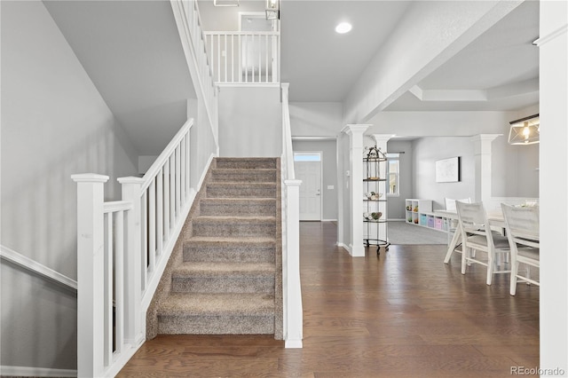 1315 Sidewinder Cir, Castle Rock, CO 80108 - stairway with wood finished floors, decorative columns, recessed lighting, and baseboards