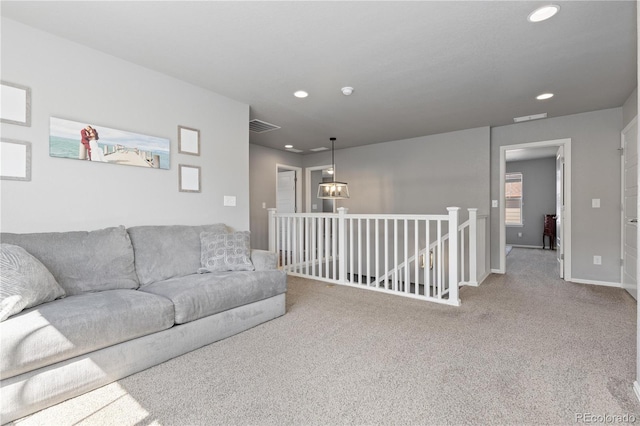 1315 Sidewinder Cir, Castle Rock, CO 80108 - living room featuring recessed lighting, carpet, a chandelier, and baseboards