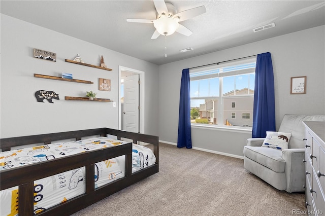 1315 Sidewinder Cir, Castle Rock, CO 80108 - bedroom with light carpet, baseboards, and ceiling fan