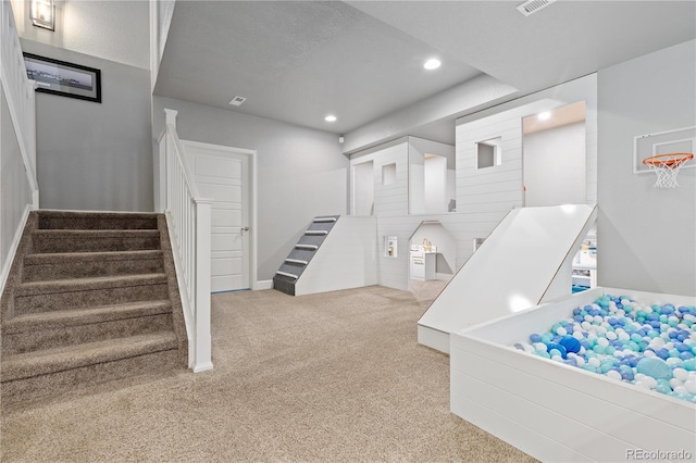 1315 Sidewinder Cir, Castle Rock, CO 80108 - game room with light colored carpet, recessed lighting, and baseboards