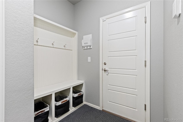 1315 Sidewinder Cir, Castle Rock, CO 80108 - mudroom featuring baseboards