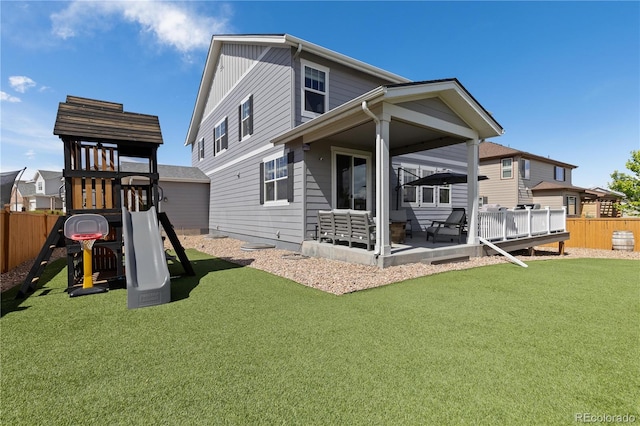 1315 Sidewinder Cir, Castle Rock, CO 80108 - back of house with a playground and a patio