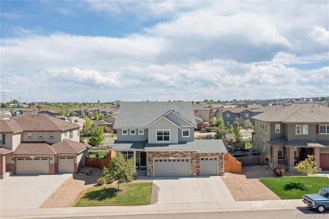 1315 Sidewinder Cir, Castle Rock, CO 80108 - view of front of house with a residential view, driveway, and an attached garage