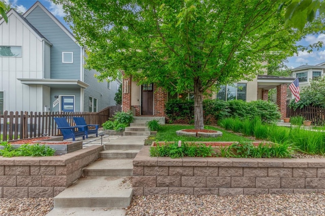 3322 W 26th Ave, Denver, CO 80211 - view of front of property with board and batten siding and brick siding