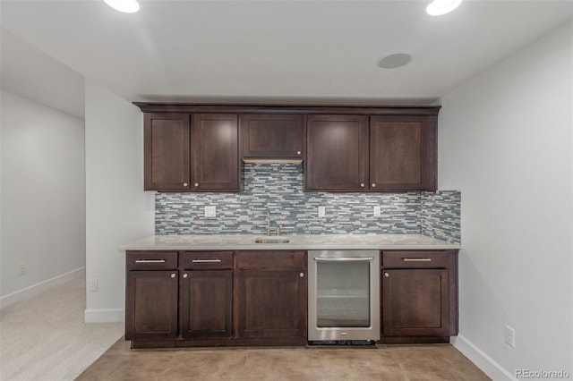 3322 W 26th Ave, Denver, CO 80211 - bar with tasteful backsplash, baseboards, and a sink
