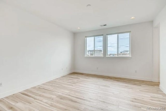 empty room featuring light wood-type flooring