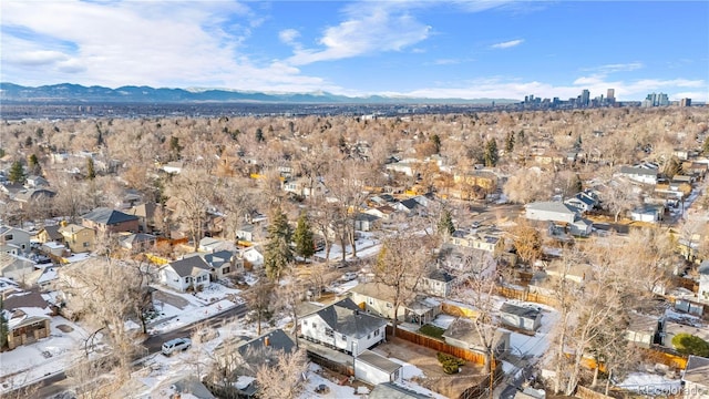 birds eye view of property with a mountain view