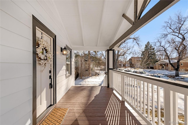 view of snow covered deck