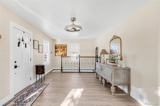 entrance foyer featuring light hardwood / wood-style floors