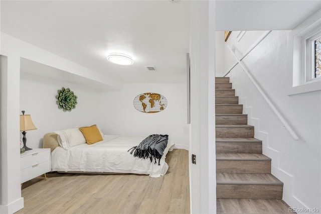 bedroom featuring hardwood / wood-style flooring