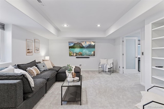 living room with recessed lighting, carpet, a raised ceiling, visible vents, and baseboards