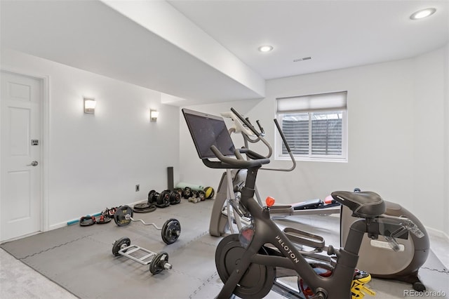 exercise area featuring visible vents and recessed lighting