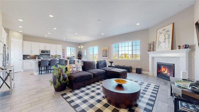 living room with light hardwood / wood-style floors