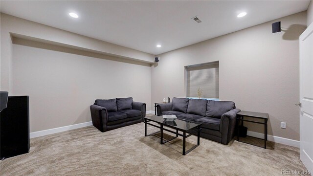 living room with light colored carpet