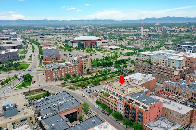 bird's eye view with a city view and a mountain view