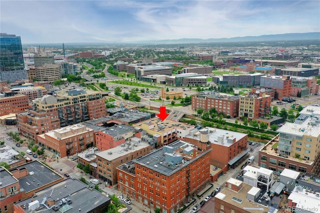 aerial view featuring a mountain view and a city view