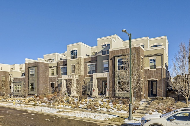 view of snow covered building