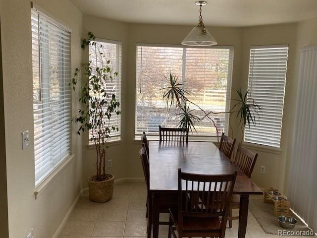 dining room with light tile patterned floors