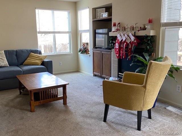 living room with light colored carpet