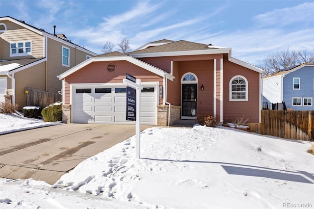 view of front of property featuring a garage