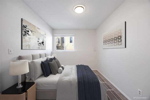 bedroom with a textured ceiling