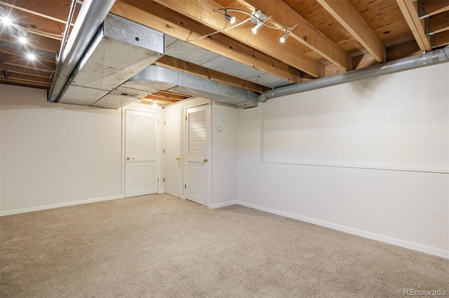 basement with carpet flooring