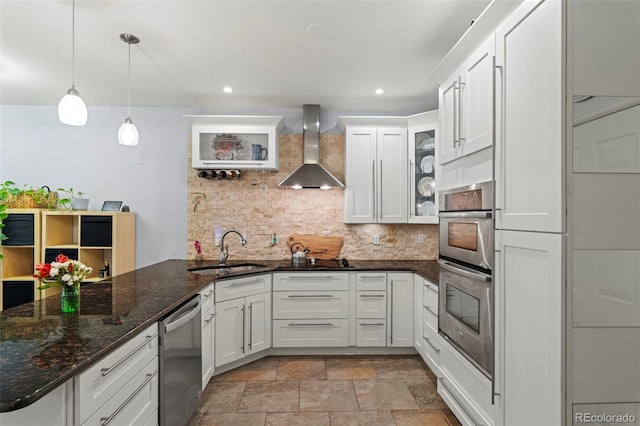2511 S Bahama Cir Unit A, Aurora, CO 80013 - kitchen with wall chimney range hood, appliances with stainless steel finishes, backsplash, white cabinets, and glass insert cabinets