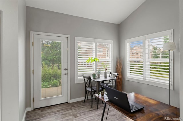 2511 S Bahama Cir Unit A, Aurora, CO 80013 - office featuring vaulted ceiling, wood finished floors, and plenty of natural light