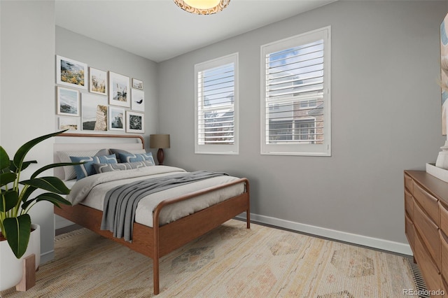 2511 S Bahama Cir Unit A, Aurora, CO 80013 - bedroom with baseboards and wood finished floors