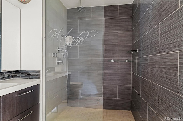 2511 S Bahama Cir Unit A, Aurora, CO 80013 - bathroom featuring vanity and a tile shower