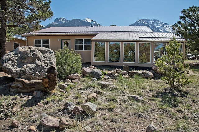 exterior space featuring a mountain view