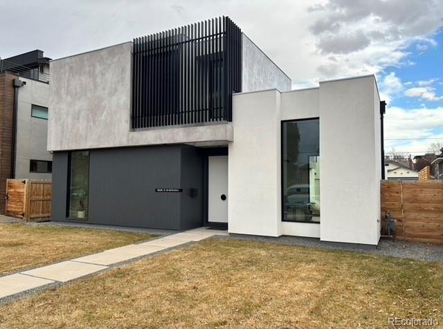 exterior space with a yard and fence
