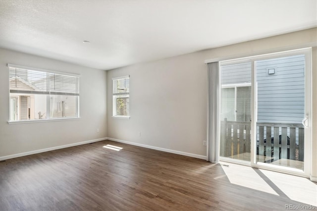 14135 Deertrack Ln, Parker, CO 80134 - spare room featuring wood finished floors and baseboards