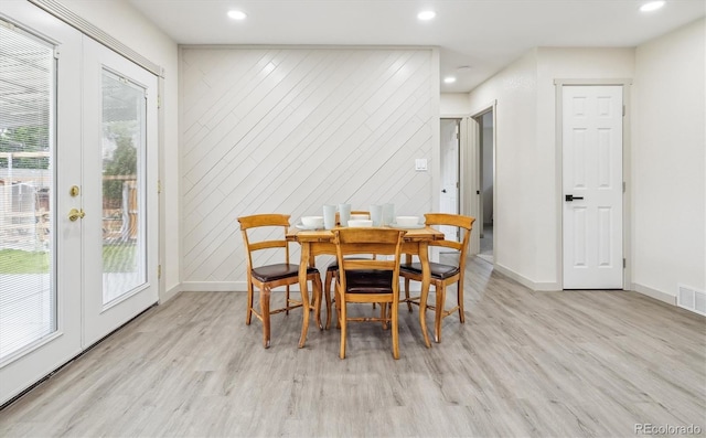 7952 Zuni St, Denver, CO 80221 - dining area featuring light wood-type flooring, baseboards, recessed lighting, and french doors