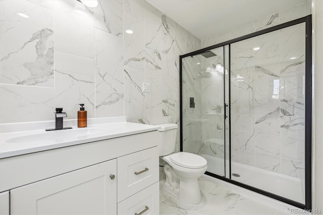 7952 Zuni St, Denver, CO 80221 - full bath featuring vanity, a marble finish shower, toilet, marble finish floors, and tile walls