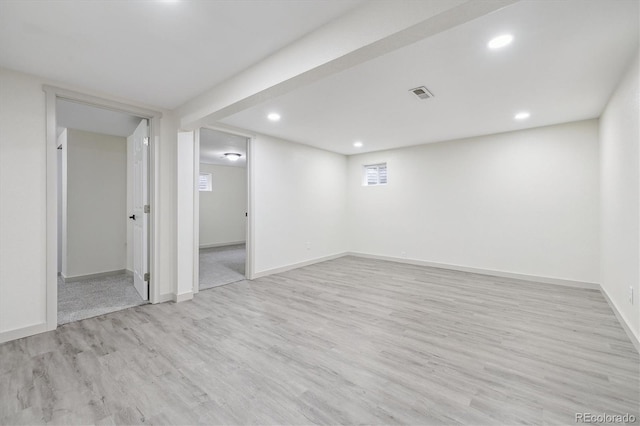 7952 Zuni St, Denver, CO 80221 - basement with wood finished floors, baseboards, and recessed lighting