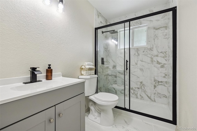 7952 Zuni St, Denver, CO 80221 - full bath featuring marble look tiles, toilet, vanity, a marble finish shower, and a textured wall