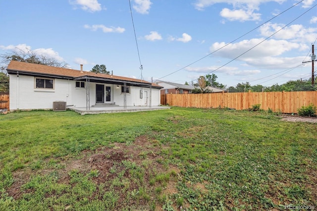 7952 Zuni St, Denver, CO 80221 - rear view of house featuring a patio area and central AC unit