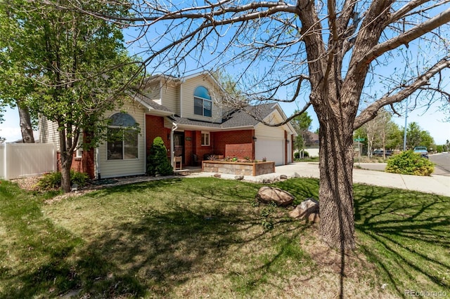 105 Hawthorn St, Frederick, CO 80530 - traditional-style home with concrete driveway, brick siding, and an attached garage
