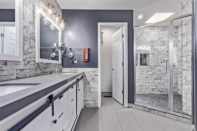 105 Hawthorn St, Frederick, CO 80530 - full bath with double vanity, a stall shower, and tile patterned flooring