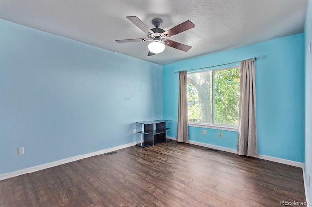 105 Hawthorn St, Frederick, CO 80530 - empty room featuring wood finished floors, a ceiling fan, and baseboards